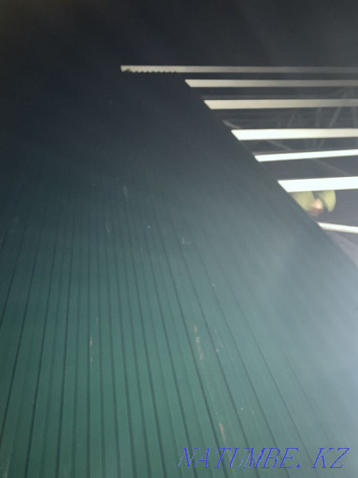 Roofers repairing the roof dismantling the roof Astana - photo 5