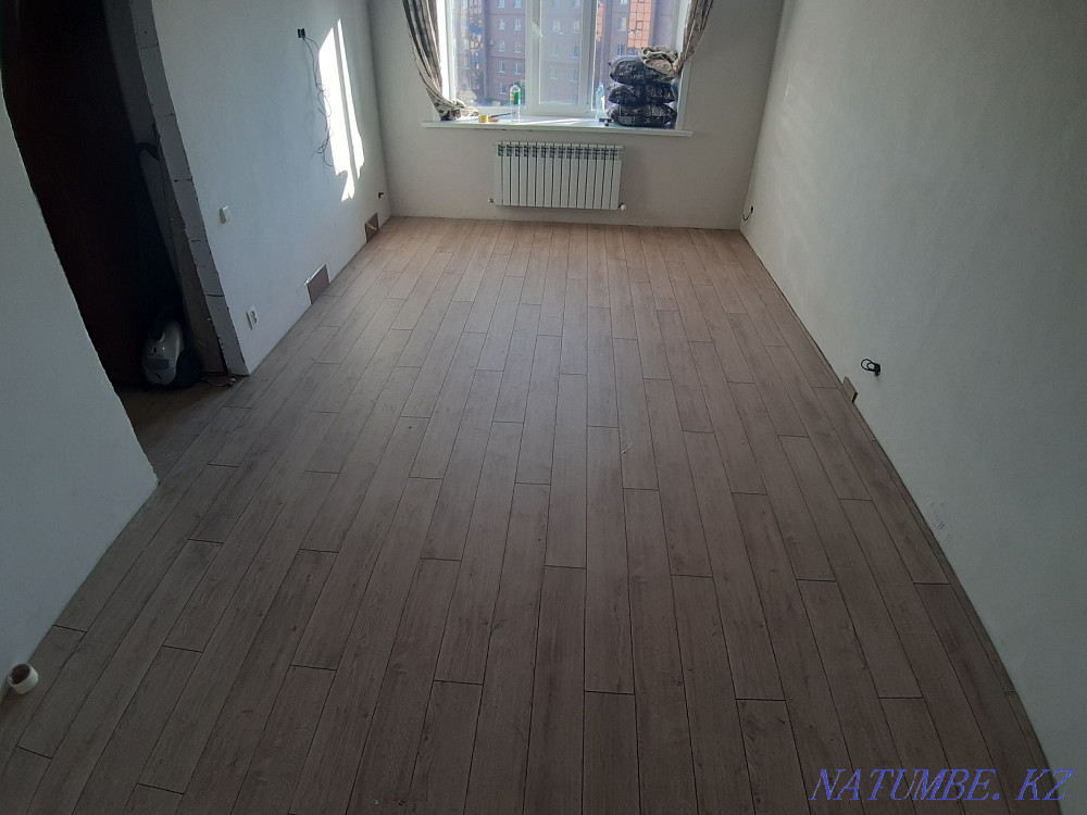 Laying laminate in Caspi Red Karagandy - photo 7