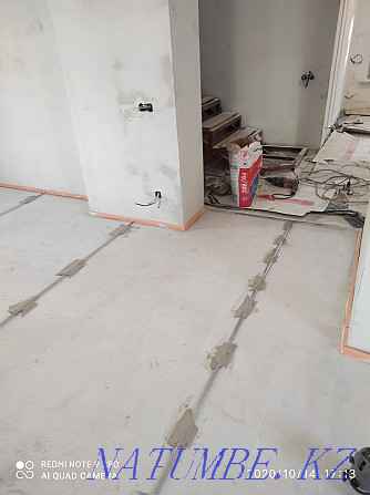 Pouring a self-leveling floor, screeds, laying laminate parquet. Astana - photo 5