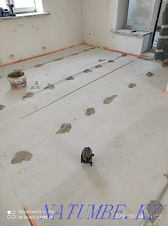 Pouring a self-leveling floor, screeds, laying laminate parquet. Astana - photo 1