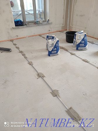 Pouring a self-leveling floor, screeds, laying laminate parquet. Astana - photo 3