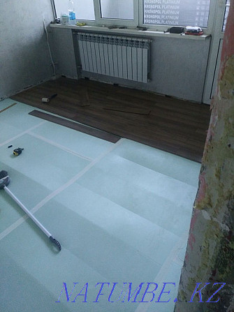 Laying laminate, linoleum, carpet, pouring self-leveling floor Almaty - photo 7