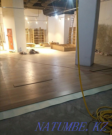 Laying laminate parquet boards, linoleum flooring professionally Astana - photo 1