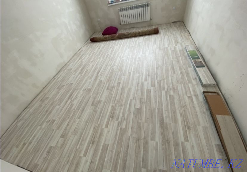Laminate laying. Per sq.m 500t Aqtobe - photo 4