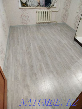 Linoleum flooring, laminate. Installation of skirting boards Pavlodar - photo 4