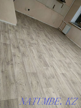 Linoleum flooring, laminate. Installation of skirting boards Pavlodar - photo 1