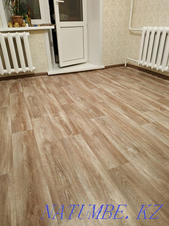 Linoleum flooring, laminate. Installation of skirting boards Pavlodar - photo 3
