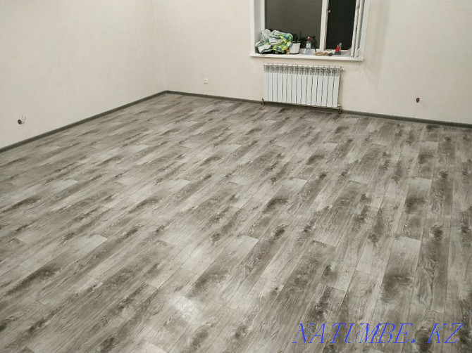 Linoleum flooring, laminate. Installation of skirting boards Pavlodar - photo 7