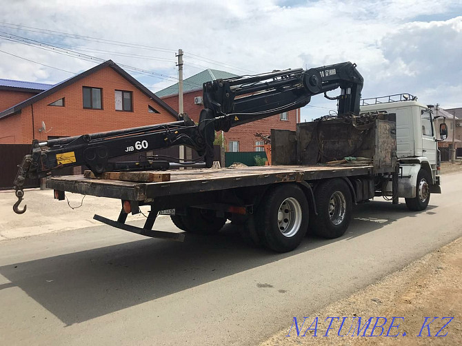 Manipulator services, boom capacity 5t, board 15t, reach 23m Oral - photo 1