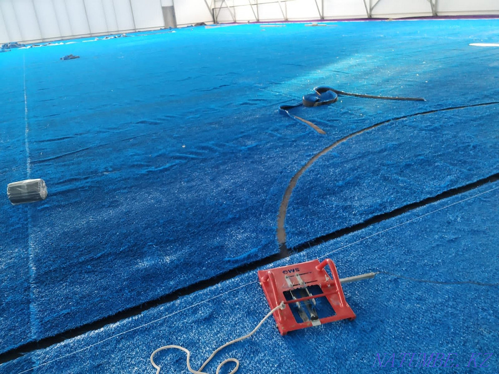 Installation of artificial turf Turkestan - photo 3