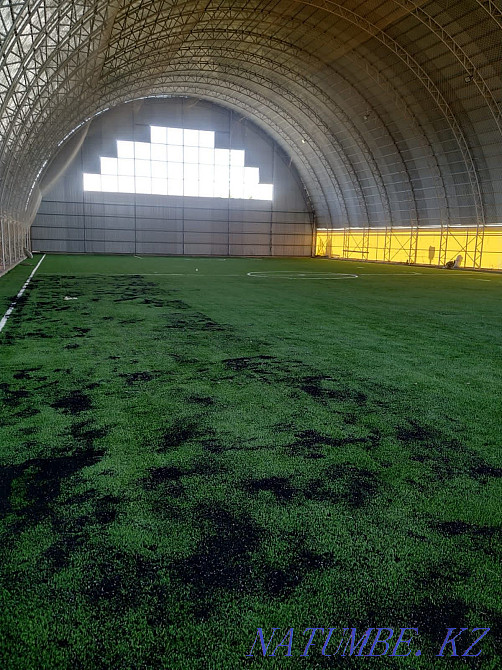 Installation of artificial turf Turkestan - photo 1
