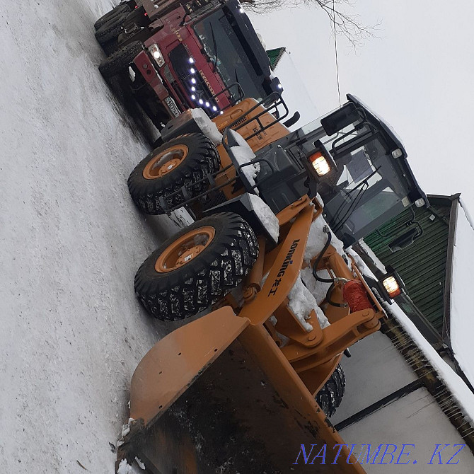 Services of a loader and dumper 25 tons. cleaning garbage cleaning the territory Karagandy - photo 1