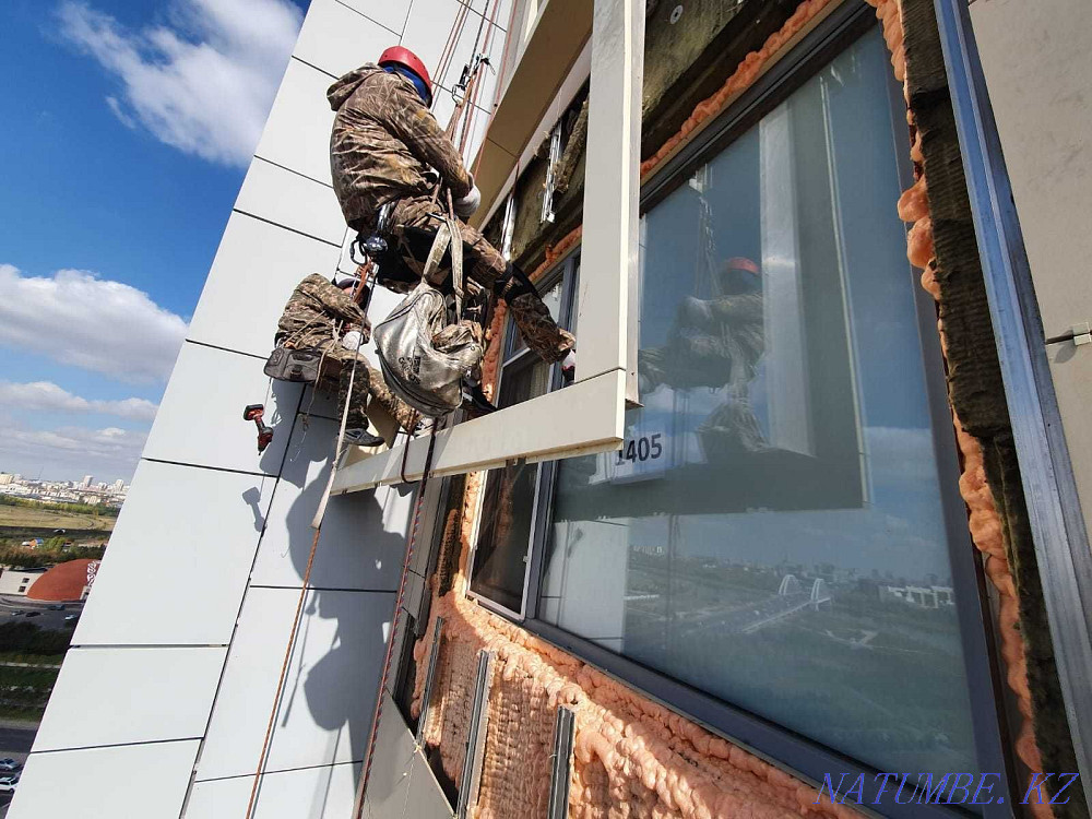 Climbers in Astana Facade works Industrial mountaineering Window washing Astana - photo 3