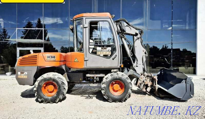 backhoe loader MECALAC 12MTX Astana - photo 1