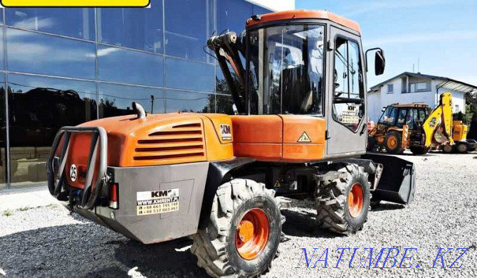 backhoe loader MECALAC 12MTX Astana - photo 2