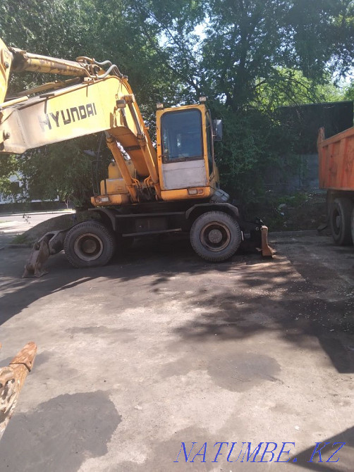 Pradam excavator Almaty - photo 1