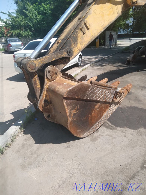 Pradam excavator Almaty - photo 2