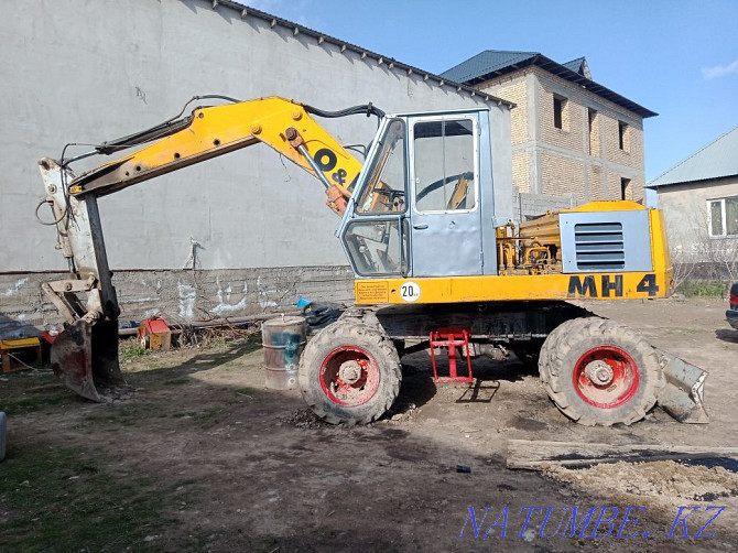 Satylady excavator Shymkent - photo 1