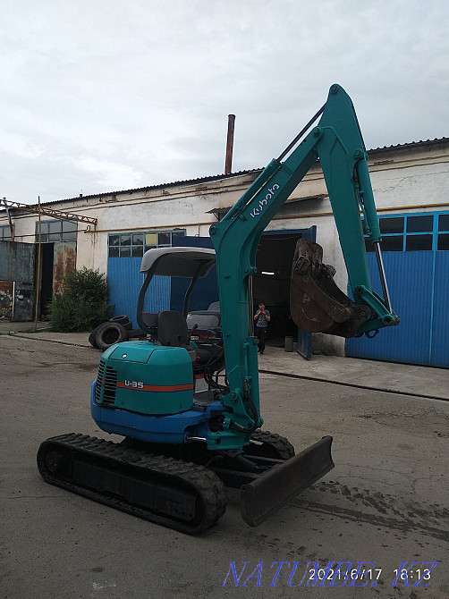 The excavator caterpillar on rubber to the course. Qaskeleng - photo 3