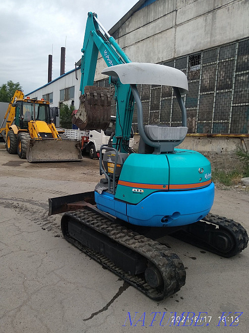 The excavator caterpillar on rubber to the course. Qaskeleng - photo 5