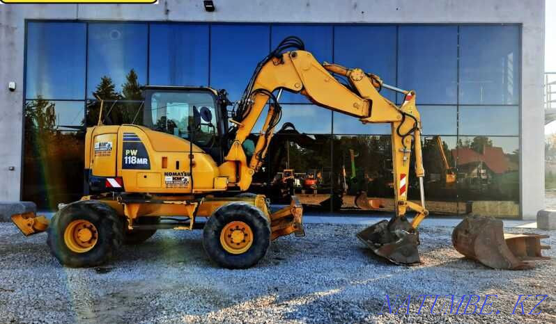 колесный экскаватор KOMATSU PW118MR-8 Астана - изображение 1