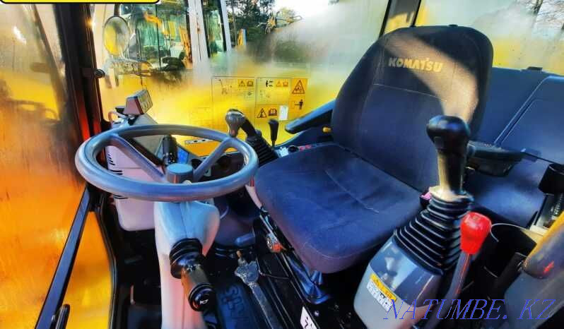 колесный экскаватор KOMATSU PW118MR-8 Астана - изображение 3