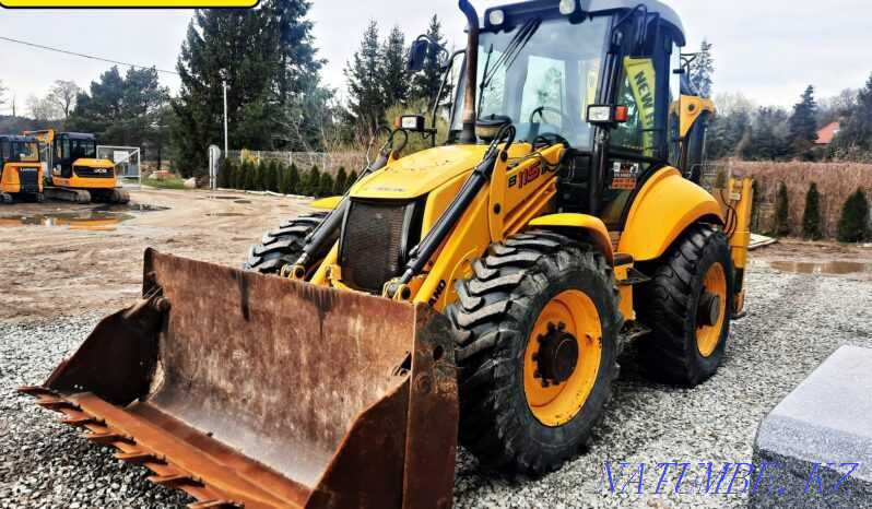 backhoe loader NEW HOLLAND B115B Astana - photo 3