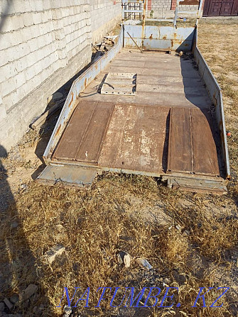 Board on the sideboard tow truck Turkestan - photo 4