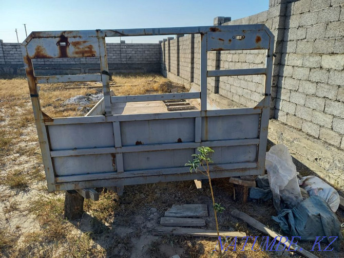 Board on the sideboard tow truck Turkestan - photo 3