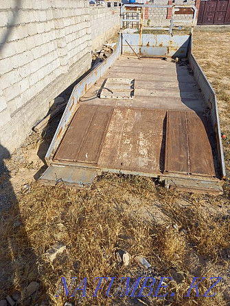 Board on the sideboard tow truck Turkestan - photo 2