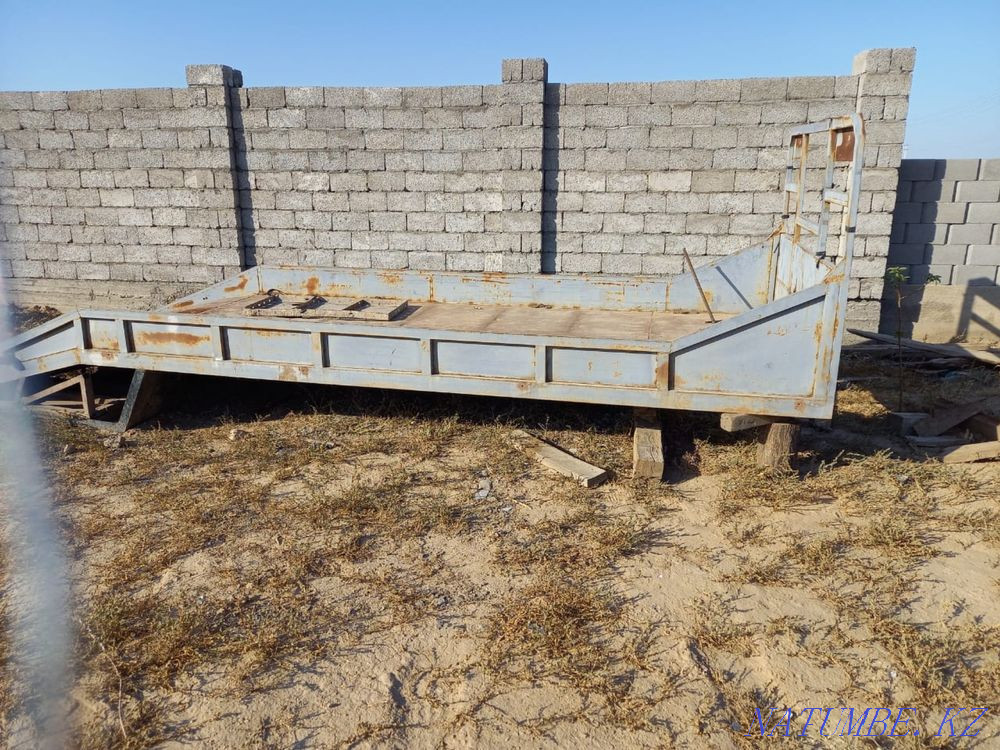 Board on the sideboard tow truck Turkestan - photo 1