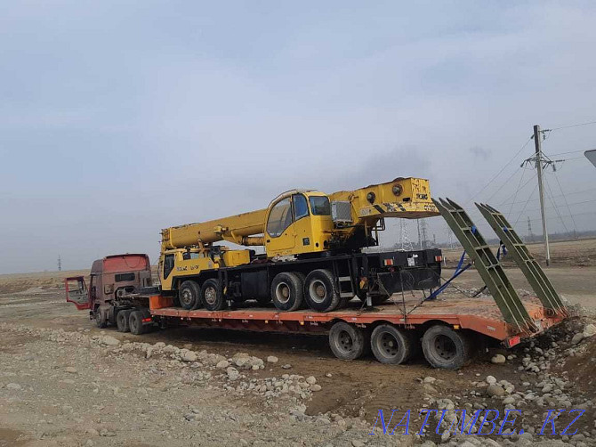 Rent a truck crane XCMG QY 50 K Chinese 50 tons Oral - photo 1