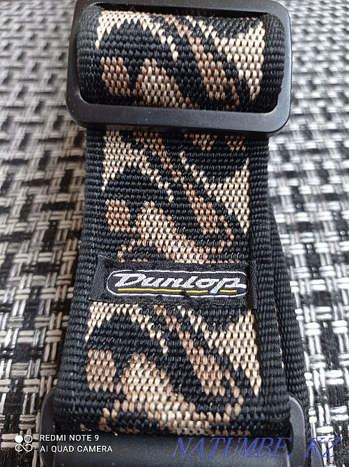 Продам новый, фирменный, мощный ремень для электрогитары DANLOP! Алматы - изображение 1