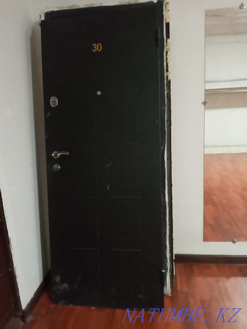 I will sell an iron front door in excellent condition inside wood veneer Almaty - photo 1