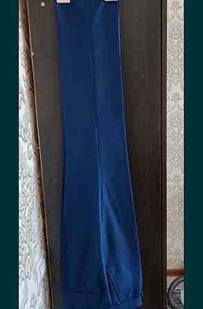 Продам мужской костюм, синего цвета, новый,46 размера,с рубашкой Тельмана