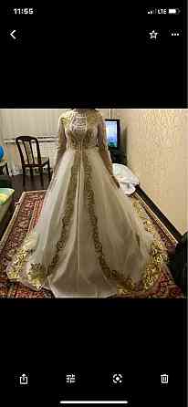 Свадебное платье и накидка с орнаментами  Орал