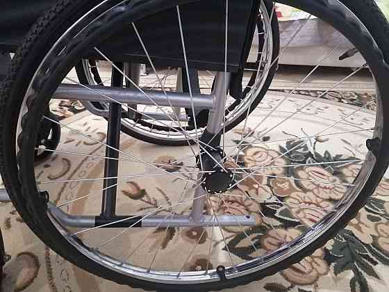 Продам инвалидную коляску  Астана