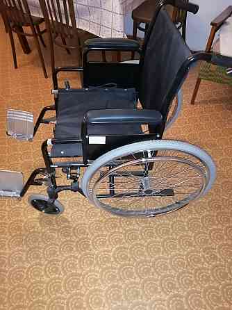 Продам инвалидную коляску Бостандык