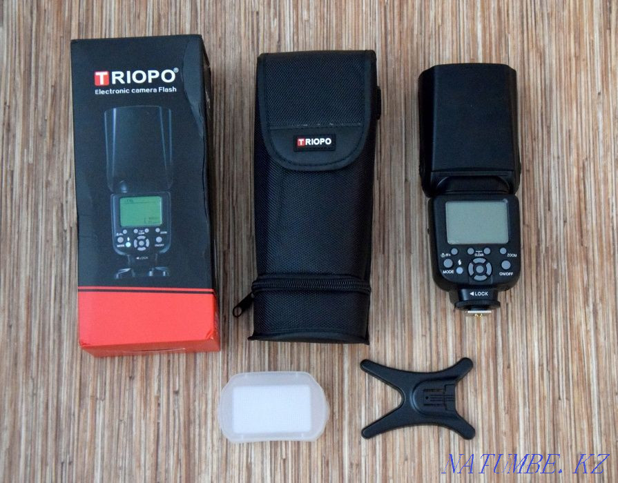 I will sell a new flash Triopo TR-586 EX for Nikon and Canon Ust-Kamenogorsk - photo 1