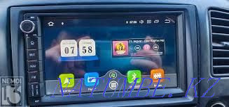 Installation of radio, subwoofers and cameras Almaty - photo 1