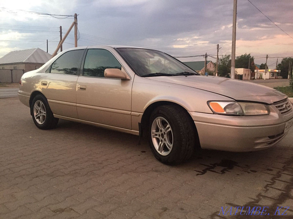 Toyota Camry    year Нура - photo 5