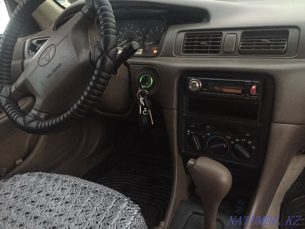 Toyota Camry    year Нура - photo 8