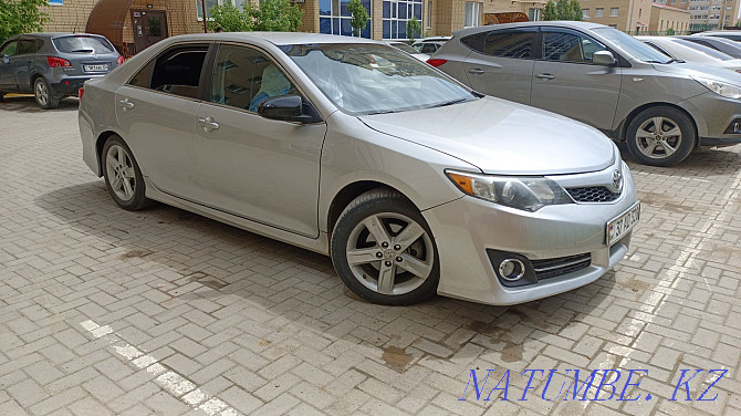 Toyota Camry    year Нура - photo 1