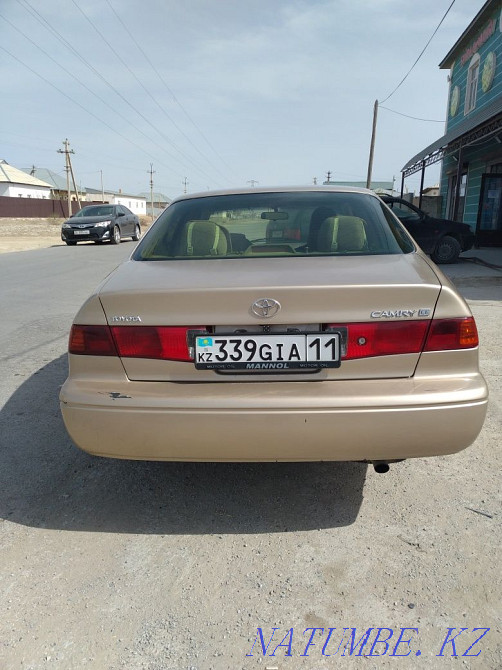Toyota Camry    year Муратбаев - photo 4