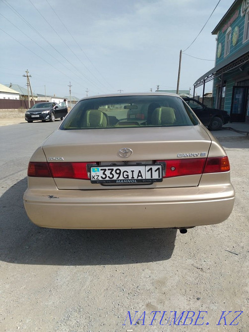 Toyota Camry    year Муратбаев - photo 5