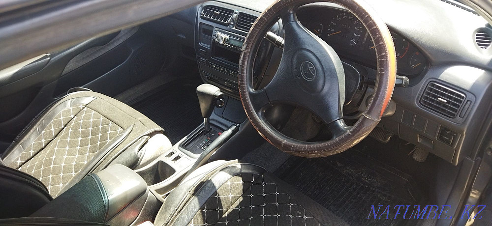 Toyota Carina    year Жарсуат - photo 5