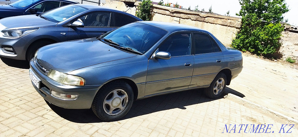 Toyota Carina    year Жарсуат - photo 2