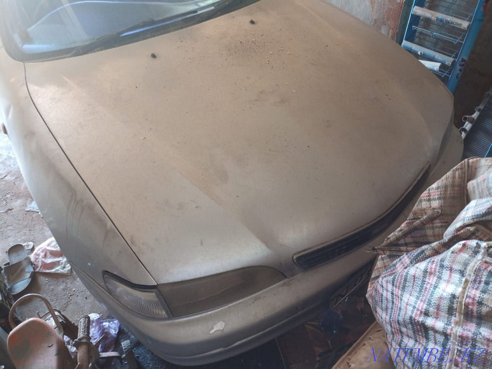 Toyota Carina ED    year им. Жанкожа батыра - photo 1