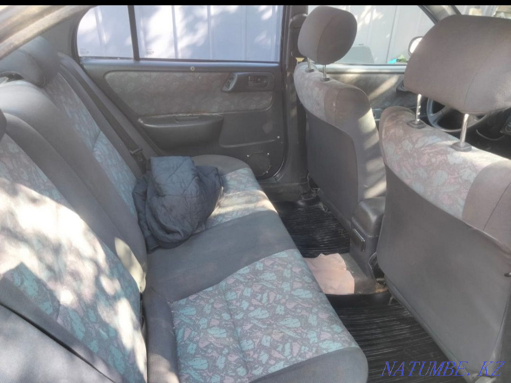 Toyota Corolla    year Нура - photo 5