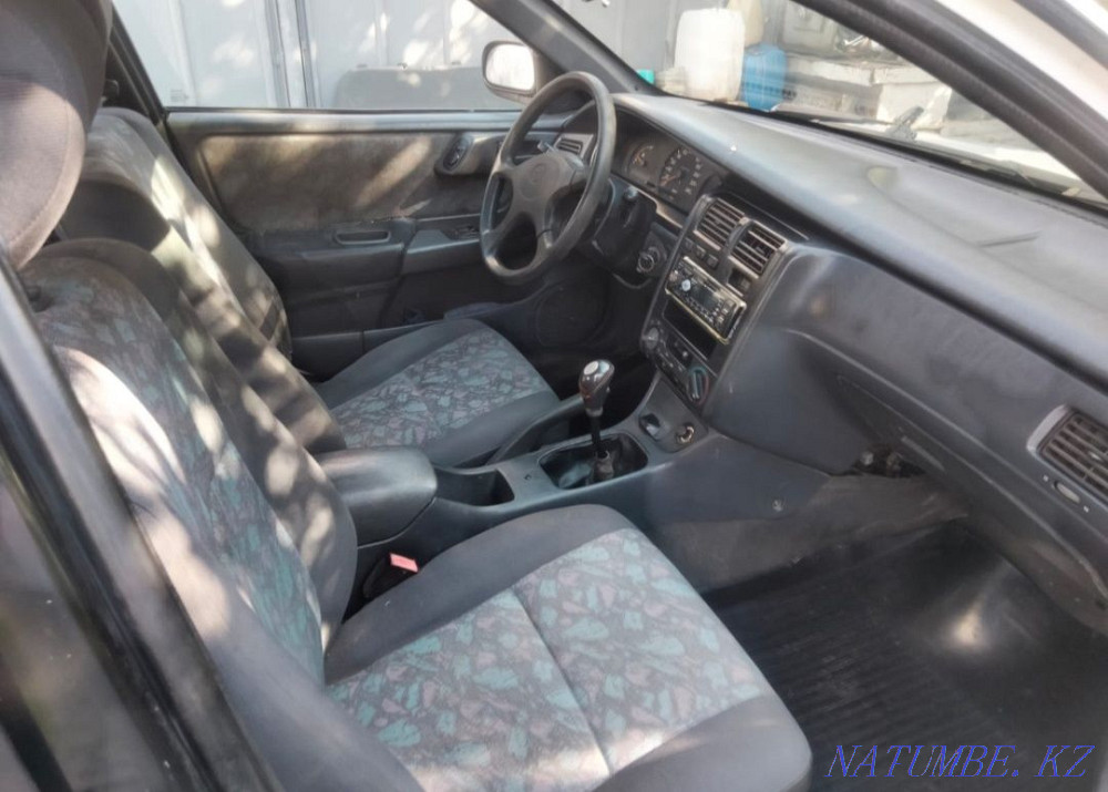 Toyota Corolla    year Нура - photo 6